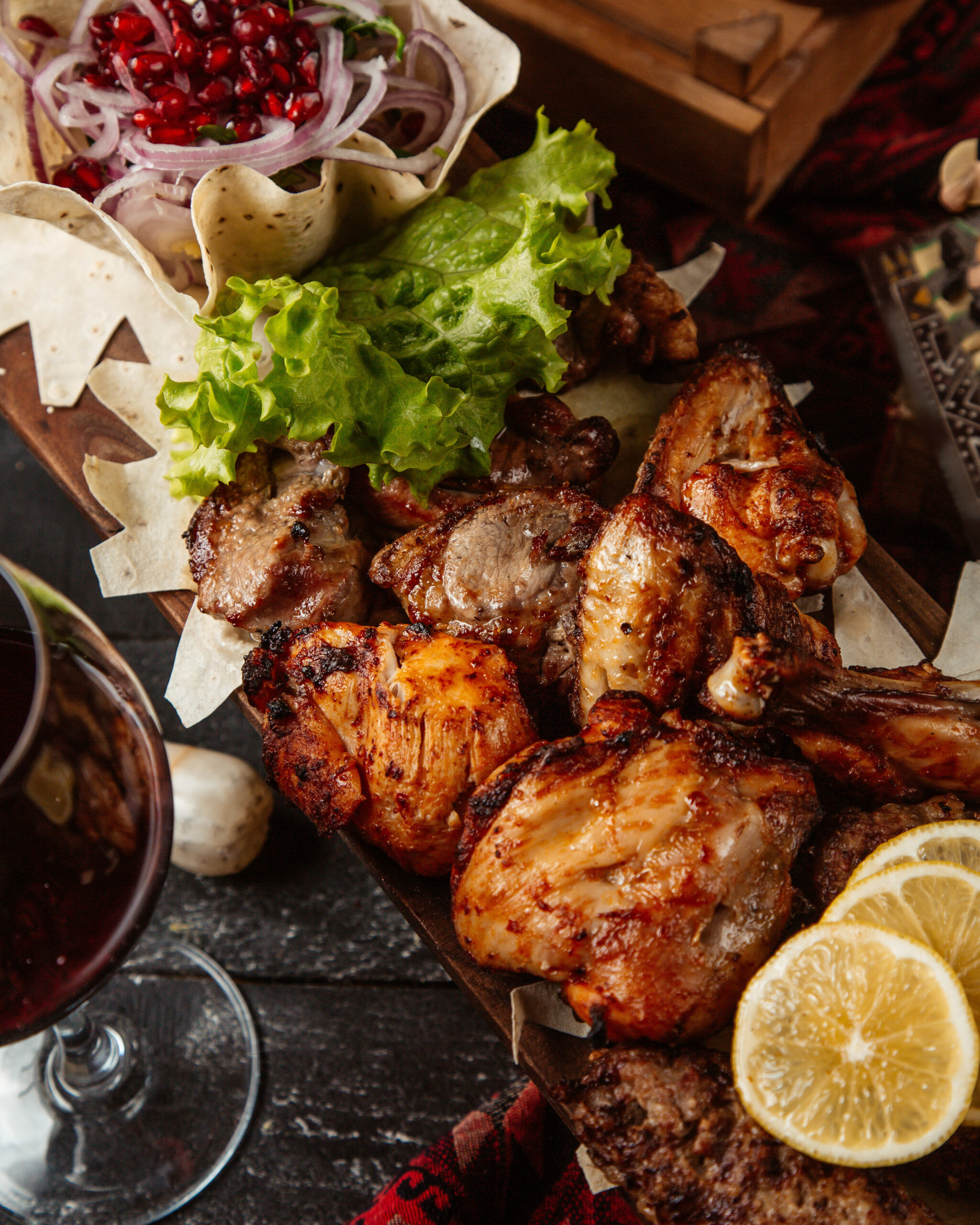 mixed roasted meat with onion and pomegranate